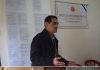 Bandera Vecinal presente en disertación de VGM Carlos Curbelo en «Instituto Juan Manuel de Rosas» de San Martín